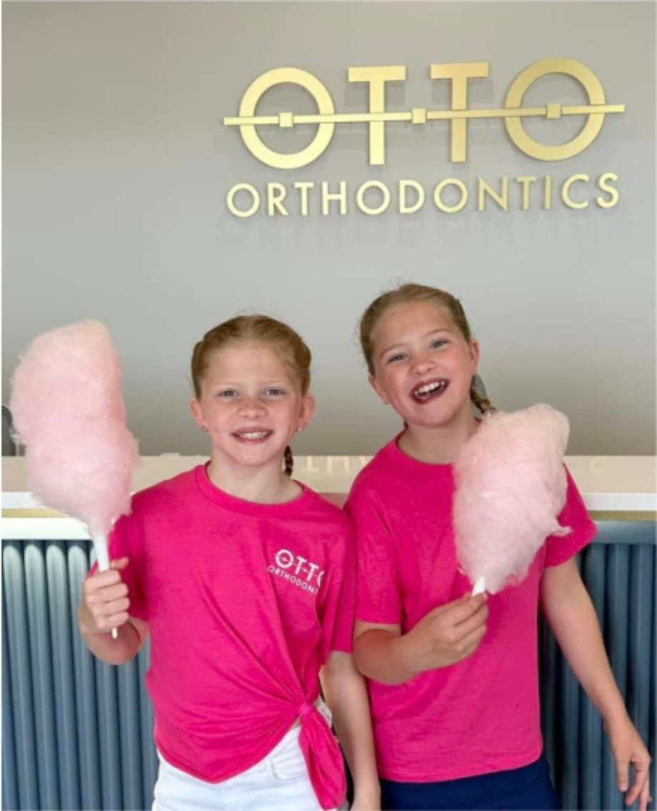 Two girls with cotton candy