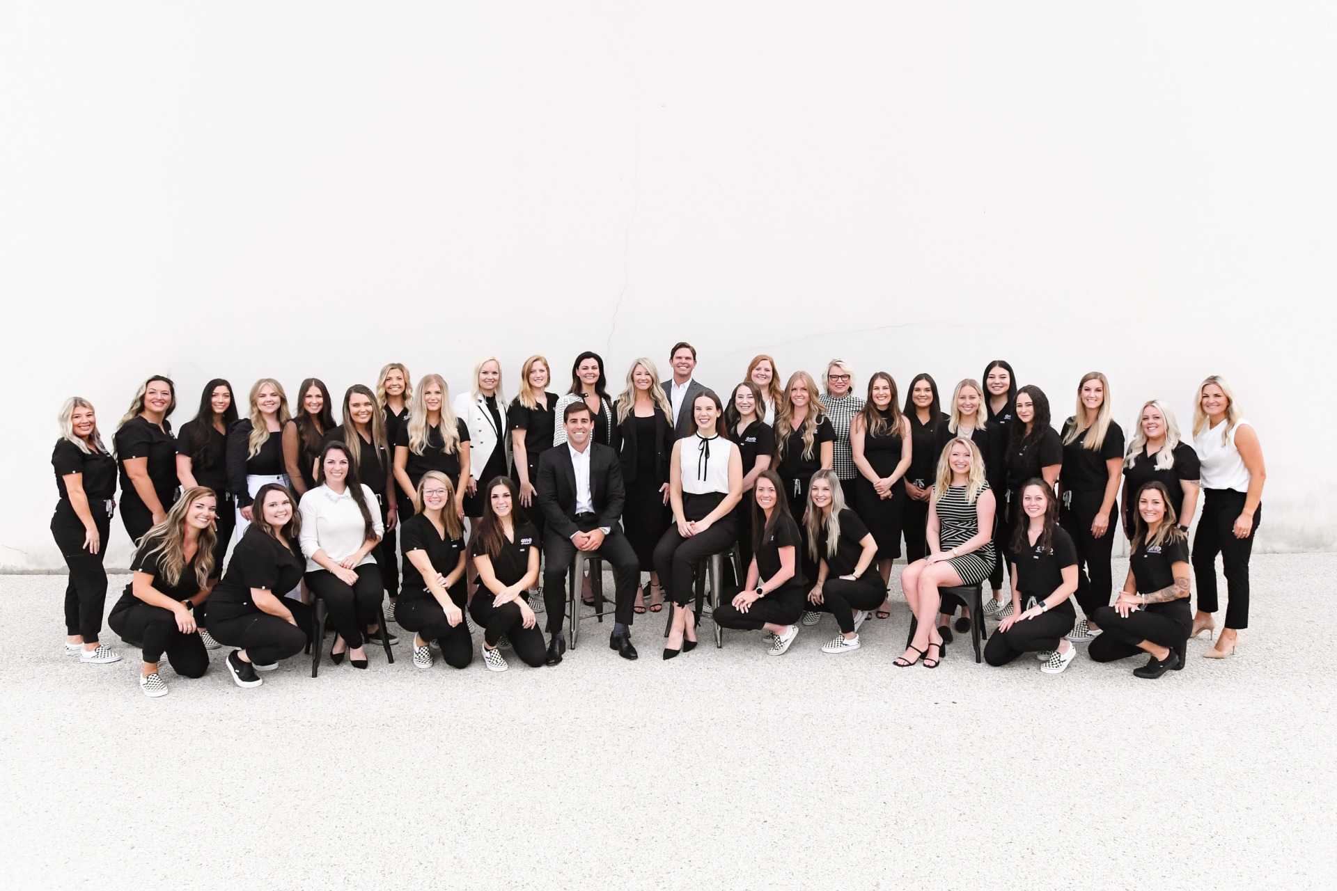 Smiling faces at Otto Orthodontics! Our dedicated team of skilled professionals, ready to make your journey to a confident smile an enjoyable one.